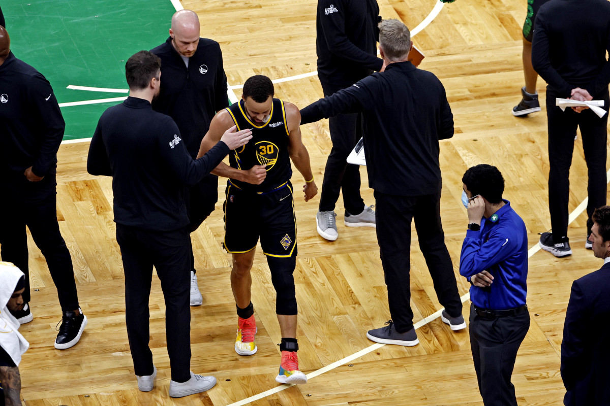 Stephen Curry takes a break in Game 3 of the NBA Finals.